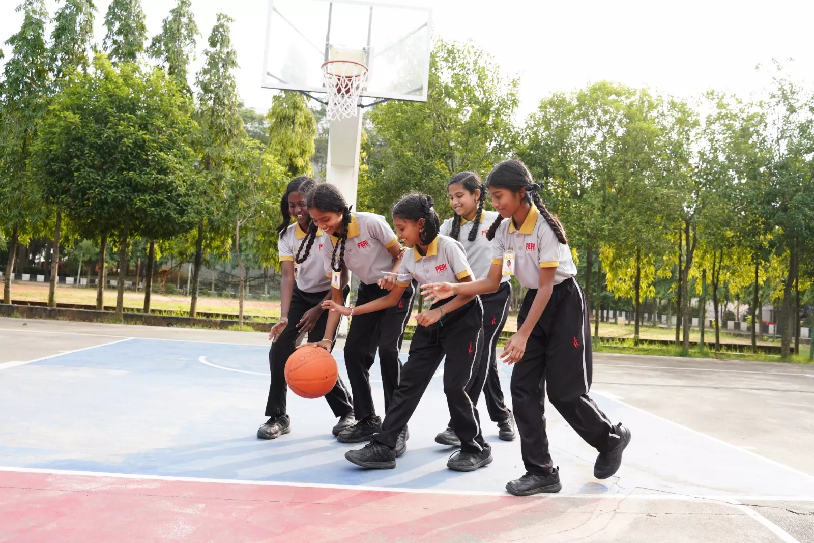 Playing basket ball in PERI School